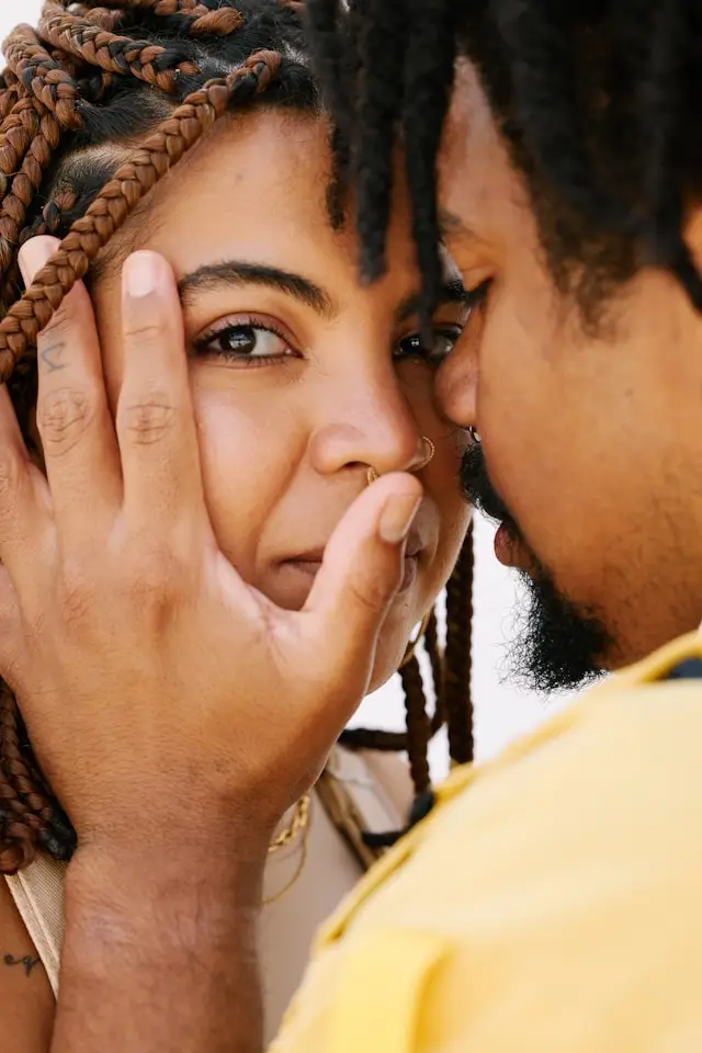 a man and a woman embracing after finding out about a terminal illness and needing counseling.